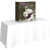 embrace-2point5ft-tabletop-push-fit-tension-fabric-display_full-fitted-graphic-left